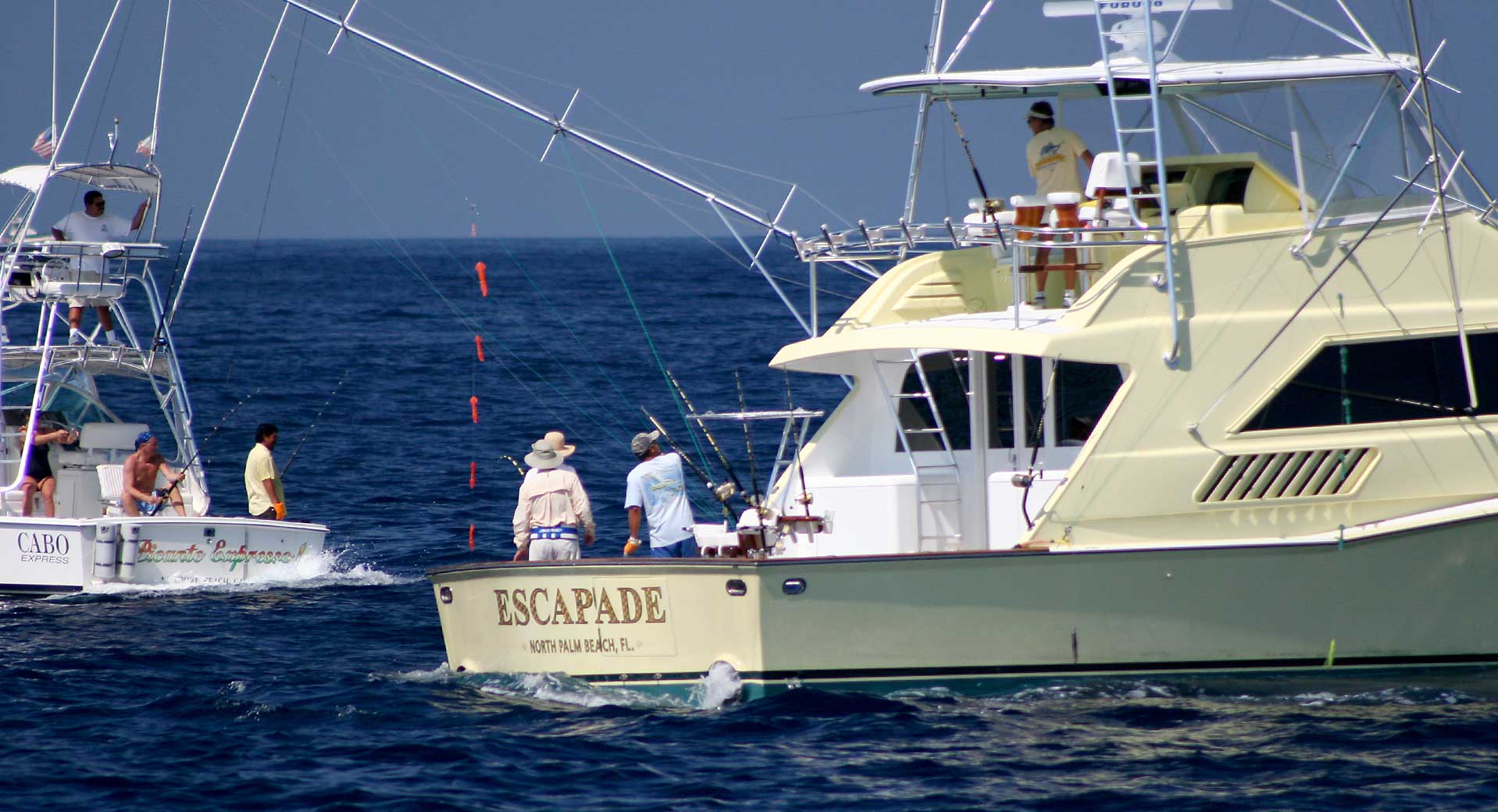 Fishing boats head out of the Cabo Marina early in the morning